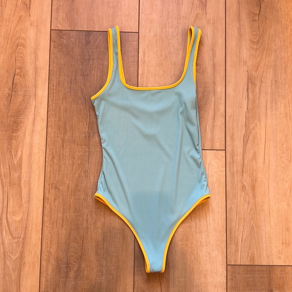 Kittenish swimsuit one piece low back